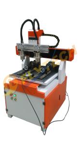Cheap New arrival small 4 axis CNC Router machine with double head double rotary axis for sale