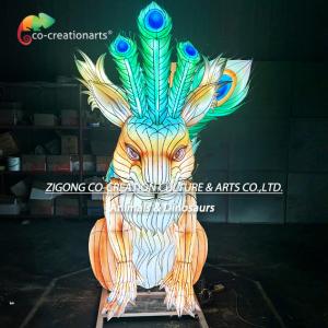 Giant Illuminated Squirrel Sculpture Lantern With Dazzling Peacock Feather Tail