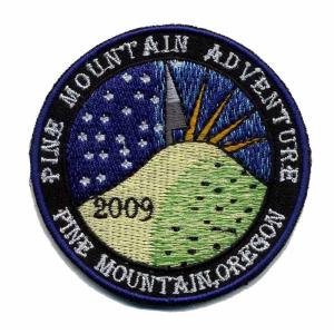 Cheap 2012 hot sale custom embroidery patches heat cut borders with heat seal backing for sale