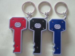 China Custom Plastic Key Shape Led Flashlight Keychain / Led Torch Keychain 8*3.5CM For School Students Gift on sale