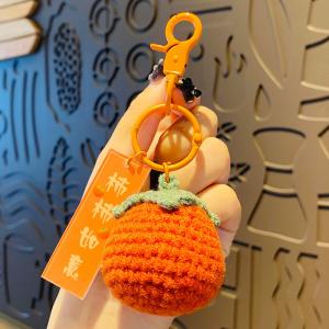 China Plush Crocheted Good Things Happen Pendant Hand-Woven Wool Persimmon Good Persimmon Peanut Bag Keychain Accessories on sale