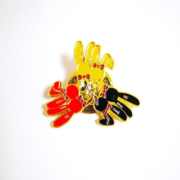 Quality Custom Metal Gold Spin Lapel Pin With Rubber Caps For Carnivals wholesale
