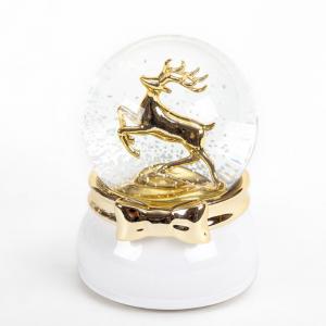 China Ceramic Base Electroplate Deer Lighted Musical Snow Globes on sale