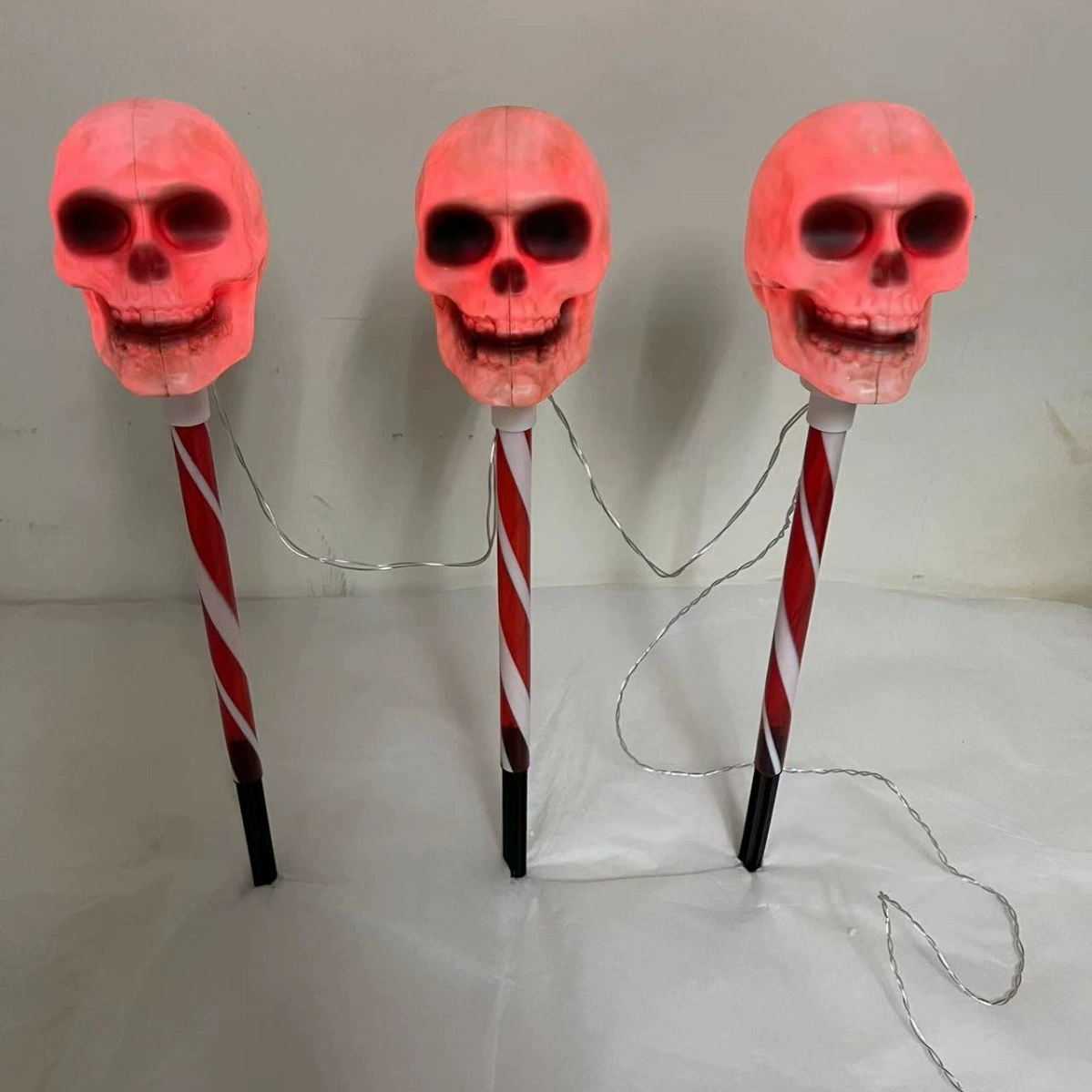 Red and white skull-shaped waterproof battery box socket lamp, one socket with
