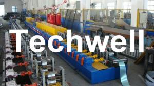 Cheap High Quality PU Foam Rolling Door Slat Roll Forming Machine With Flying Saw Tracking Cut for sale