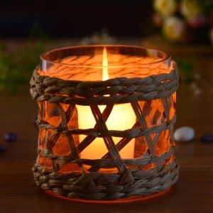 China Round Creative Glass Candle Holders With Wicker Sleeve on sale