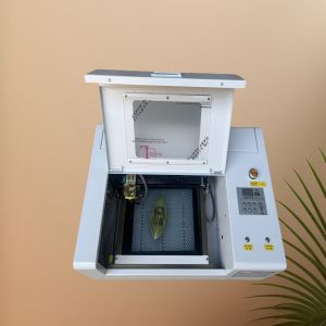 CNC Laser Cutting And Engraving Machine With CO2 Laser Tube For Textile Wood