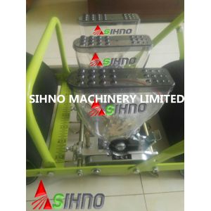 China 3 Rows Manual Vegetable Seeder Hand Push Vegetable Planter for Onions Seed on sale