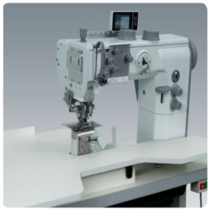 Computerized attaching shoulder pads to armholes and trimming edge sewing