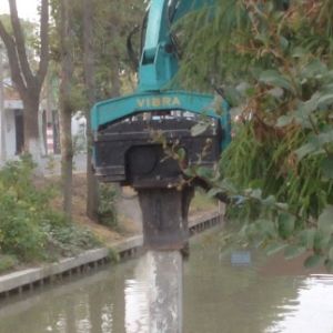Sheet Pile Driving Machine - Yellow Color & Excavator-Mounted Flexibility