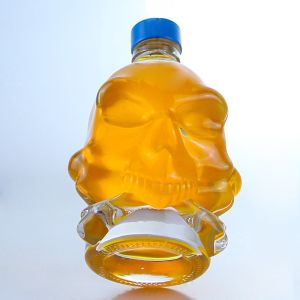 Decal Surface Skull Shape Glass Liquor Bottle for Whisky Vodka Brandy Aging