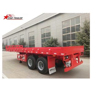 Cheap 2 Axles 30ft 30Ton Flatbed Semi Trailer For Transporting Construction Machinery for sale