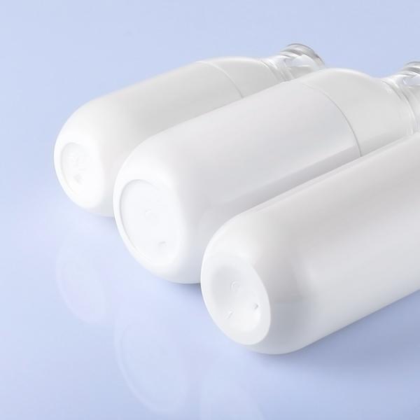 White 2 Oz Clear Plastic Spray Bottles PET Material Round Shape for Perfume