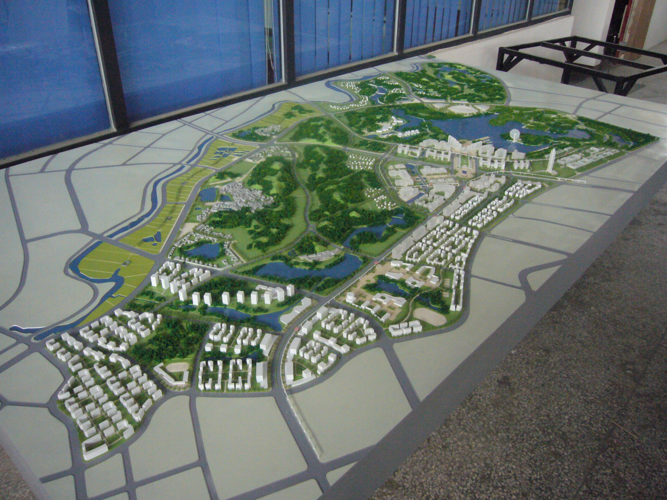 Architectural Model of Urban Master Plan with Green Landscape, Roads, and Mixed