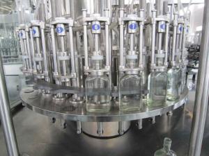 Cheap Negative pressure glass wine bottling plants / wine filling machine / wine bottle filler for sale