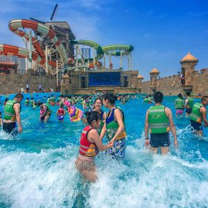 Surf wave pool machine artificial tsunami wave style swimming pool equipment surfing simulator machine for water park