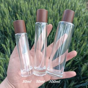 Cheap 100ml Perfume Spray Atomizer Bottle Glass Empty Cylindrical Wooden Lid for sale