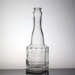 Customized Surface Handing Football Shaped Glass Bottle for Unique Alcohol