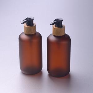 China 250ml Frosted Amber Cosmetic PET Bottle With Bamboo Pump on sale