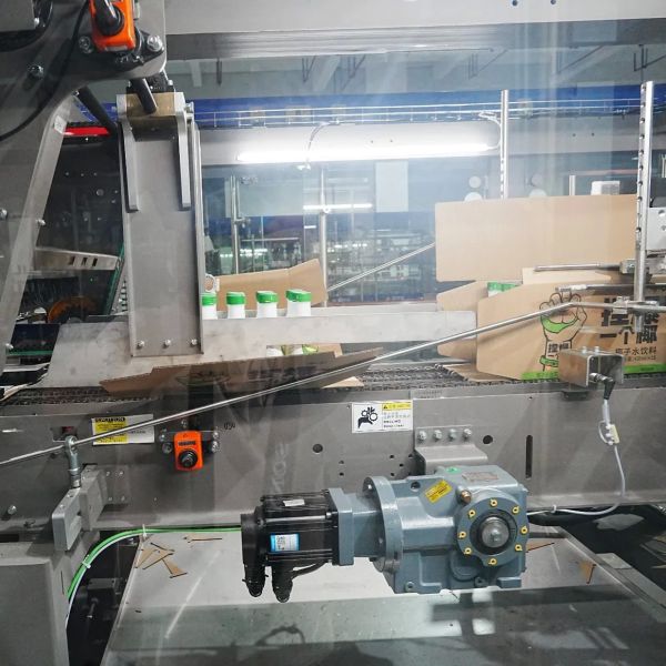 Quality 30kw Fully Automatic Wrap Around Case Packer Cartoning Machine with 45box/Minute Capacity and Mechanical Stretch wholesale