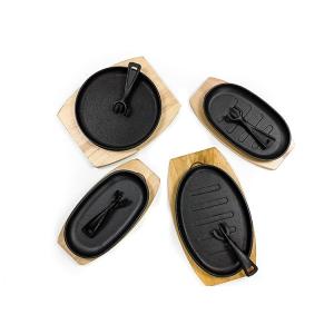 China Pre Seasoned Cast Iron Sizzle Platter Cast Iron Steak Pan sets With Wooden Base on sale
