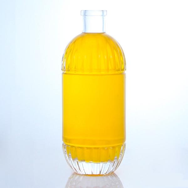 Quality Industrial Beverage Glass Bottle with Embossed Design and Cork Round Shape wholesale