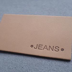 China Hot Stamping Straight Cut Embossed Leather Patches For Jeans on sale