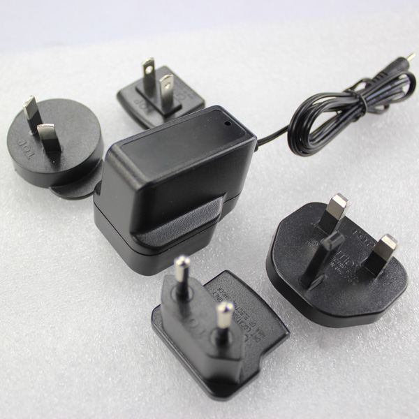 Quality us to uk extrangeable plug 5v1a power adapter with fcc and bs approved wholesale