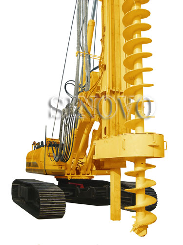 Rotary drilling rig TR250W mounted on original CAT base with pull winch system