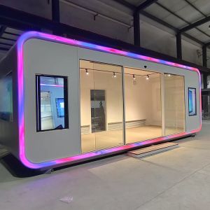 Installation of Apple Cabin House with Metal Carved Panel Exterior Wall and