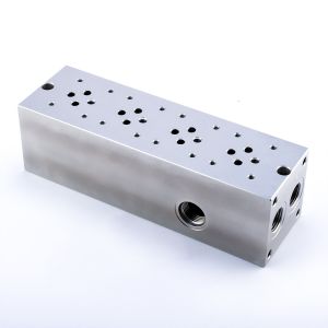Multifunctional integrated hydraulic manifold block