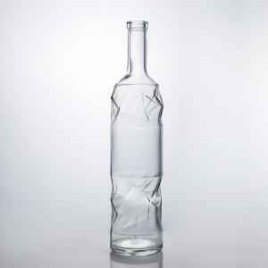 China Highly Durable Liquor Glass Bottle with Embossed Pattern and Cork Stopper Perfect on sale