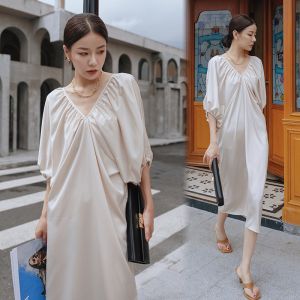 China Five Point Sleeve Loose Women'S Beachwear Dresses Backless Stitching French Style Dress on sale
