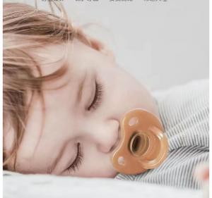 China Liquid super soft bear pacifier anti bloating silicone baby sleeping toy pacifier on sale