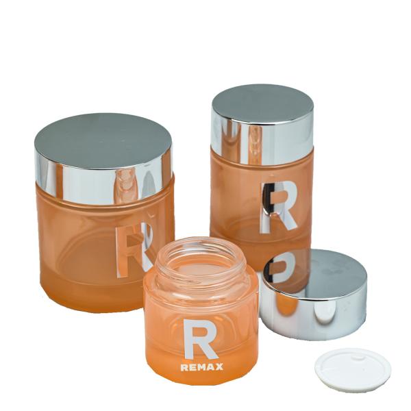 Quality Cosmetics Packaging Silver-plated Large Cap Pink Transparent Glass Lotion Bottle Dropper Bottle Cream Jar Set wholesale