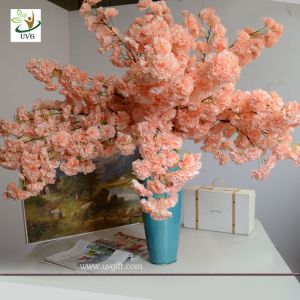 UVG silk flower arrangement in artificial blossom tree branches wedding