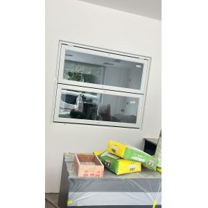 Vineyard-Facing Folding Window Configuration Framing Rolling Grape Rows and