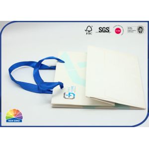White Coated Paper Shopping Bags Custom Size Matte Lamination With Blue Handle