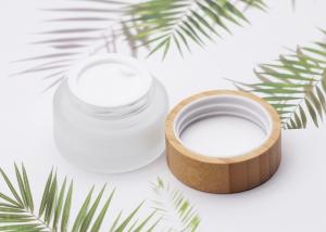 China Cylinder Glass Cosmetic Cream Jar Container With Bamboo Screw Cap 50ml on sale