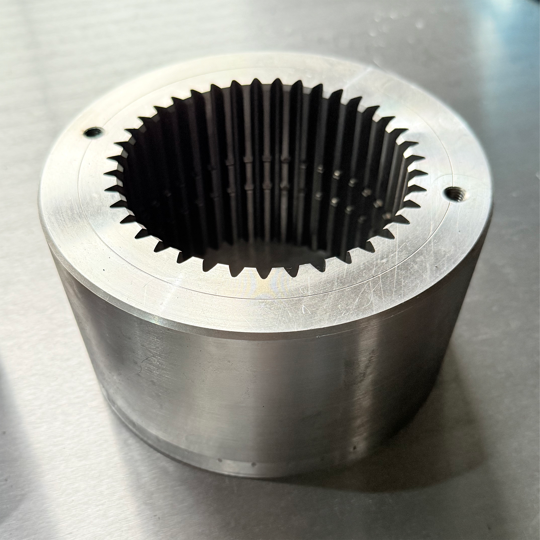 High Load-Bearing Capacity of Internal Spur Gear for Large-Scale Construction Machinery