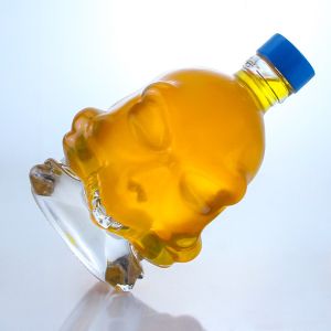 Decal Surface Skull Shape Glass Liquor Bottle for Whisky Vodka Brandy Aging