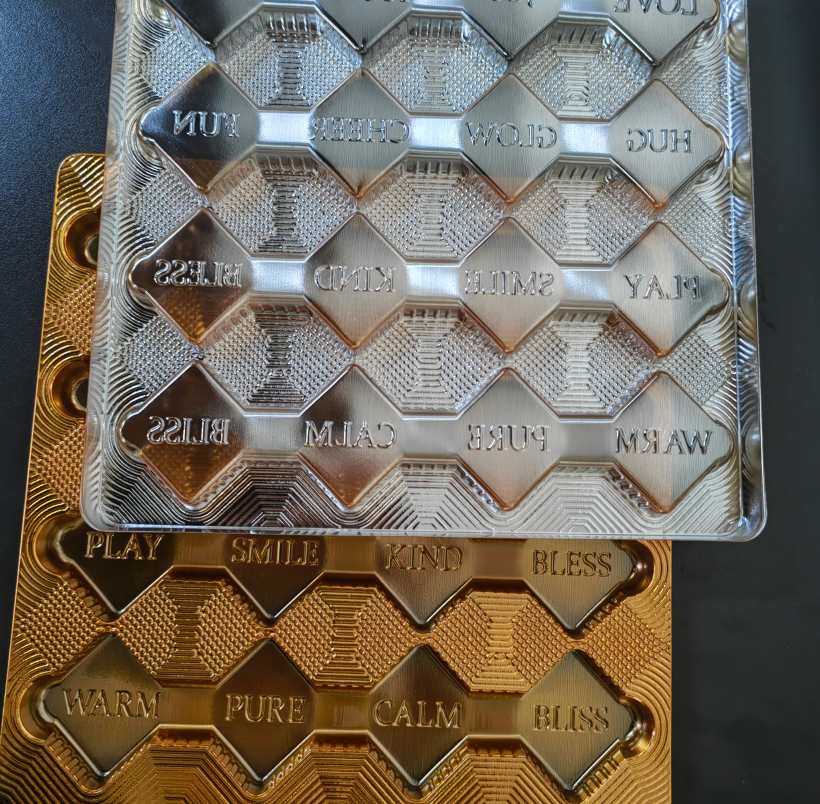 Customized disposable gold 16 compartment PET chocolate container with logo