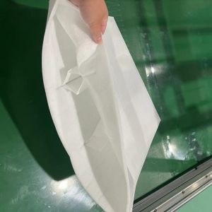 Machine Capable Of Customizing Primary Trapezoidal Bags Of Various Sizes