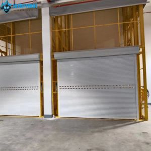 China Manual Hydraulic Warehouse Lifter Mezzanine Floor Goods Lift With Safety Brake on sale