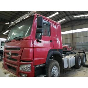 China 2015 made in china tractor head 6*4 10 Tires Sinotruck Howo tipper  dump truck tractor truck flatbed semi-trailer on sale