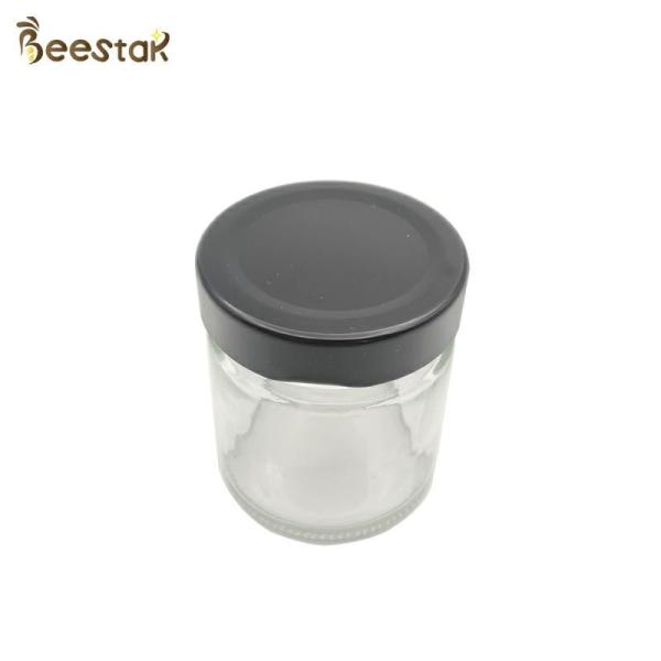Quality 250ml Honey Jar And Spoon Glass Bottle For Honey Packaging wholesale