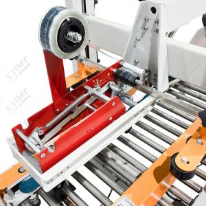 Automatic one-word carton sealing machine matched with automatic four-corner