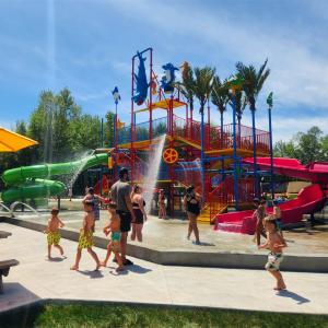 Cheap Customizable Medium-Sized Playground Water Slide for All Ages with Fiberglass and Galvanized Steel Construction for sale