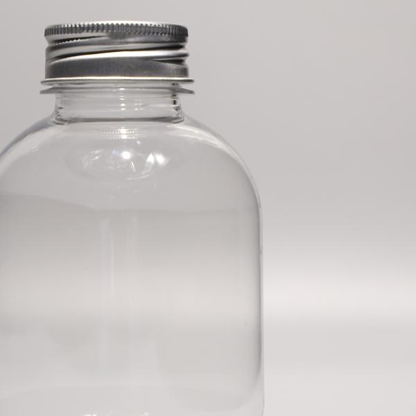 Quality Durable Round PET Bottles with Screw On Lids for Tight Sealing wholesale