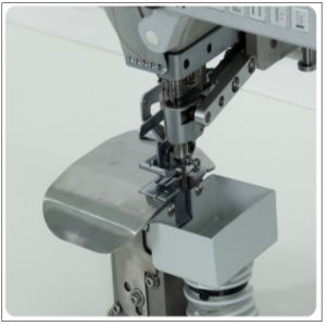 Computerized attaching shoulder pads to armholes and trimming edge sewing